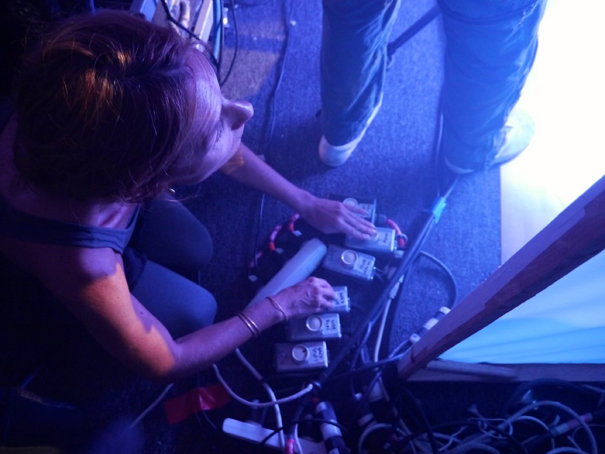 Professional stage lighting equipment in a dark arena