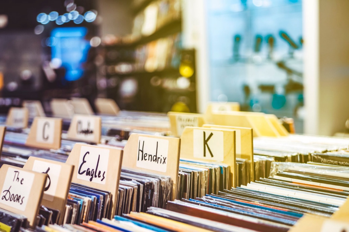 A collection of K-pop albums and fan merchandise on a table