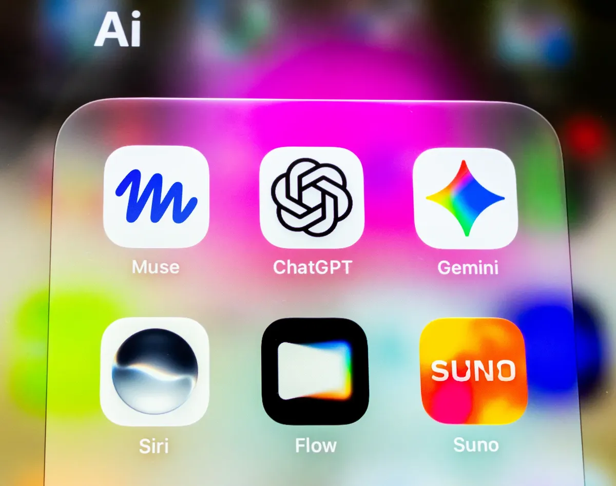Colorful close-up of AI app icons on a smartphone screen featuring Muse, ChatGPT, Gemini, Siri, Flow, and Suno.